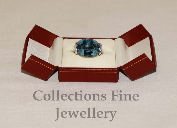 Blue Topaz and White Gold Ring
