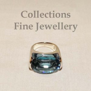 Blue Topaz and White Gold Ring